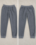 Two views of heather gray jogger pants laid flat on a light textured background, labeled POVA 6 Neo with measurements 23mm and fabric code 1/1.4 1/25s ISO722 / ISO760.