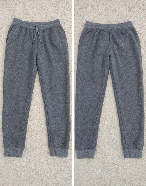 Two views of heather gray jogger pants laid flat on a light textured background, labeled POVA 6 Neo with measurements 23mm and fabric code 1/1.4 1/25s ISO722 / ISO760.